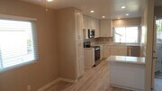 Photo - REMODELED 2BR; 2BA end unit condo with 1 car garage & 1 parking space