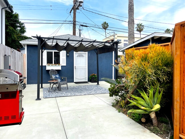Shaded patio sitting area with brand NEW grill! - 3541 Helms Ave House