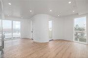 3BR, 3BA - 1,175SF - Living Room - 3844 W 27th St Apartments