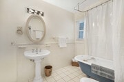 Primary bath w/ clawfoot tub shower - 28 Clubhouse Ave Unit Lower