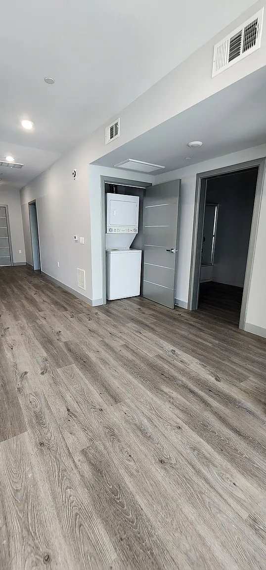 Building Photo - 7040 Woodman Ave Unit 204