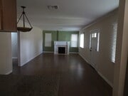 Living Room (Viewed from Kitchen) with Functioning Fireplace (plus Gas Accessory) & Dining Area - 5643 Cedros Ave