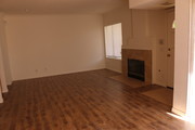 Living room with fireplace - 12411 Osborne St Townhome