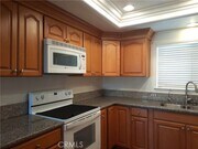 Photo - 2384 Via Mariposa W Condo Unit 3F
