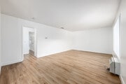 2BR, 1BA - 965SF - Living Room - Pioneer Plaza
