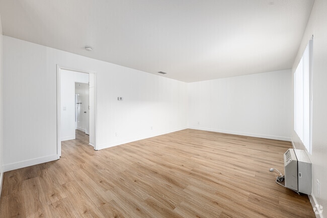 2BR, 1BA - 965SF - Living Room - Pioneer Plaza