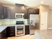 Photo - "Modern Comfort Awaits: Spacious 3-Bed, 3.... Apartment