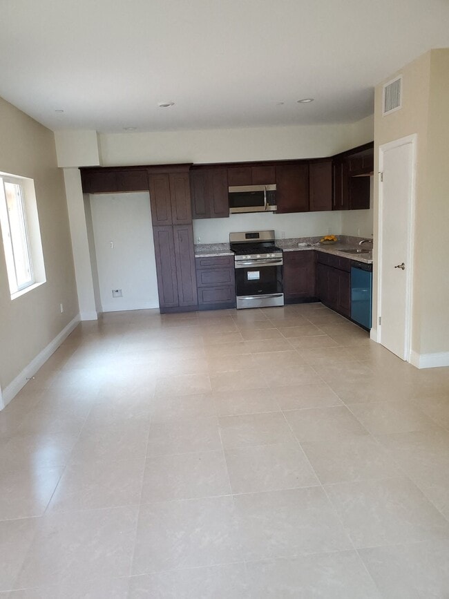 Building Photo - Beach Cities Villas