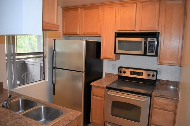 Photo - Upper-Level Condo with Vaulted Ceilings & Granite Finishes Unit B2