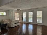 living room and entry way - 120 N Berendo St Unit 120