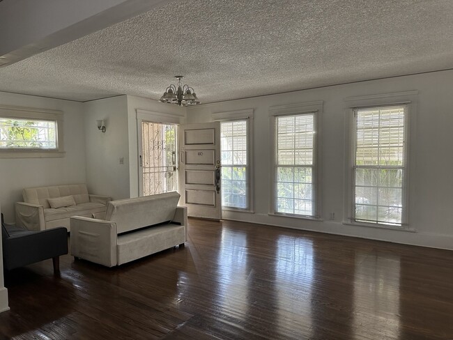 living room and entry way - 120 N Berendo St Unit 120