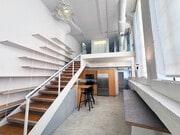 entry view with 17' high wall of bookshelves - 200 N San Fernando Rd Condo Unit 110