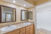 3BR, 2BA - 1,100SF - Bathroom - Citrus Court Apartments