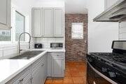2BR, 1.5BA - 675SF - Kitchen - 8214 Norton Ave