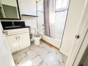 Photo - 130 E 104th St Townhome
