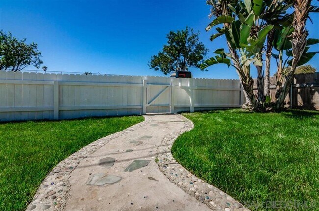 Photo - Remodeled 3 bedroom 2 bath. Fenced yard. Outdoor shower, deck ,attached garage. Near beaches.