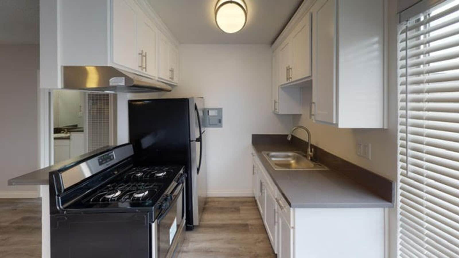 Photo - Berryman Apts...Newly Remodeled Apartments Available...Large Windows...Washer/Dryer in Unit!