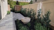 Private side yard with fountain and custom landscape - 590 Catalonia
