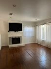 Livingroom has wood burning fireplace - 21050 Avenue San Luis