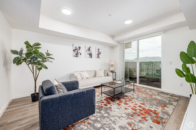 2BR, 2BA - 939SF - Living Room - The Ace at Ardmore