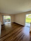 Photo - 2BR/1BA Lakeside ground floor condo with 1 car detached garage, 1 uncovered parking space & commu... Unit A