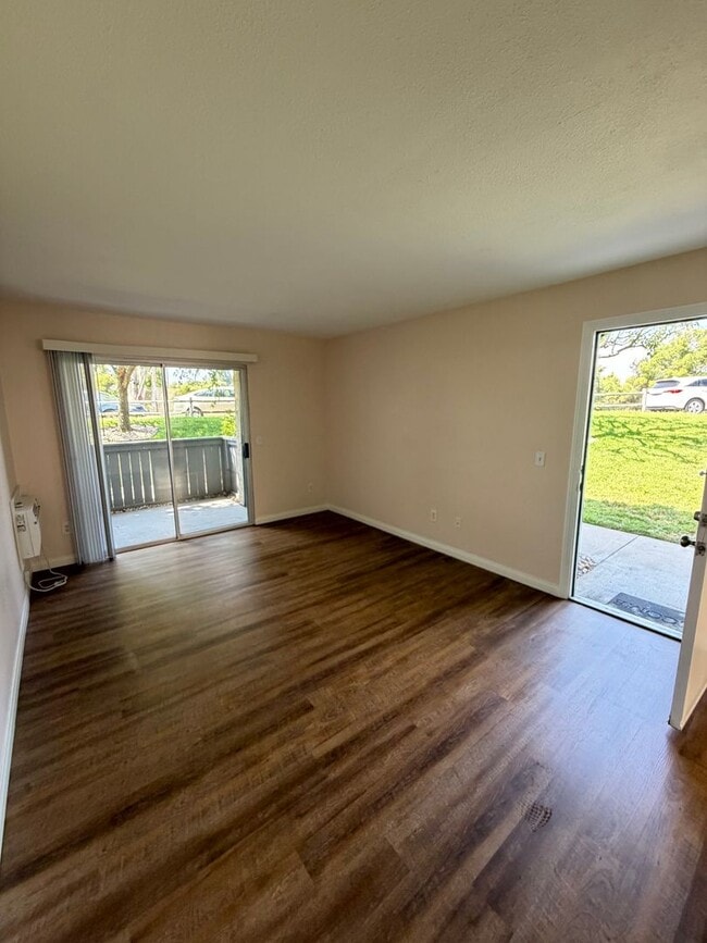 Photo - 2BR/1BA Lakeside ground floor condo with 1 car detached garage, 1 uncovered parking space & commu... Unit A