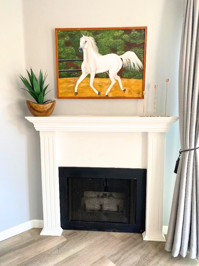 Gas Fireplace with white mantle. Feel free to decorate your space for the holidays! This is the per - 220 Woodland Pky Unit 250