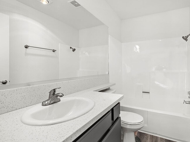 Modern styled bathroom with shower and tub. - Corbin Terrace