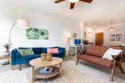 Modern coastal living room with West Elm seating and abundant natural lightt - 2221 Ocean Ave Unit 202