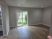 Photo - 14747 Woodruff Ave Apartment