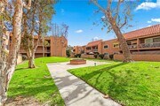 Photo - 6600 Warner Ave Condo Unit 118