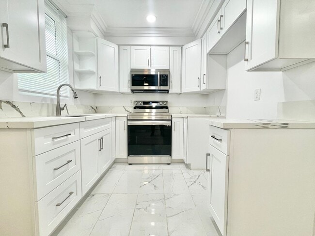 Building Photo - 6060 Fulton Ave Unit 9