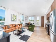 Our living areas feature smart home technology, including keyless entry and smart thermostats, while oversized windows flood your space with abundant sunlight. - Modera Pomona