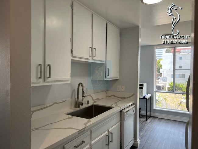 Building Photo - 11857 Texas Ave Unit 204