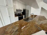 Photo - Two-Story 2 Bedroom, 1 Bath Lakeside Condo with Solar! Unit 2