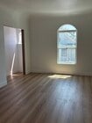 Living room at entry to apartment - 2109 1/2 W 54th St Apartments Unit 2109 W 54th