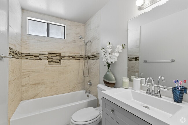 2BR, 1.5BA - 925SF - 1st Bathroom - Village Green