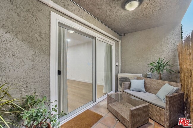 Building Photo - 9005 Cynthia St Unit 116