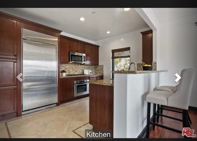 Photo - 10319 Almayo Ave Unit 101