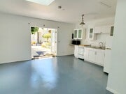 Open plan studio with French doors - 6713 Murietta Ave Apartments Unit Studio