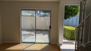 Frontroom patio door and entry - 10125 De Soto Ave Townhome