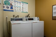 Laundry Facility - Huntington Plaza Senior Apartments | Affor...