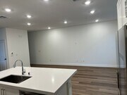 Open living room off of kitchen - 438 Caliper Way