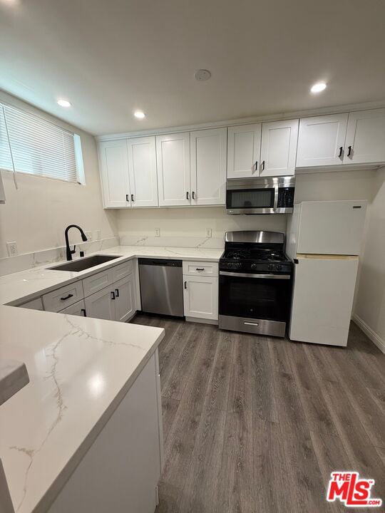 Building Photo - 6006 W Pico Blvd Unit 1/2