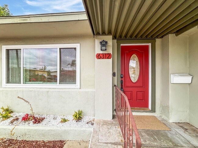 Photo - SD: Charming 2BD/2BA Home in La Mesa with Wraparound Porch, Turf Backyard & Attached Garage