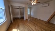 Closet and living space - 2807 2nd St Apartments Unit 4