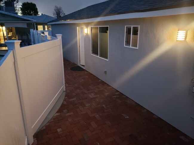 Private entry way with it's own space and courtyard - 7650 Ostrom Ave
