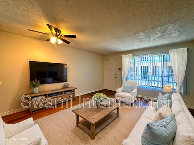 Building Photo - 26120 Belle Porte Ave Unit #03