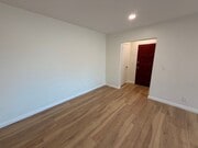 Photo - Completely Remodeled, Spacious 2 Bedroom Apartment For Rent w/ Parking! Unit E