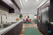 Kitchen with Stainless-Steel Appliances and Dining Room - Hudson Lux by Wiseman